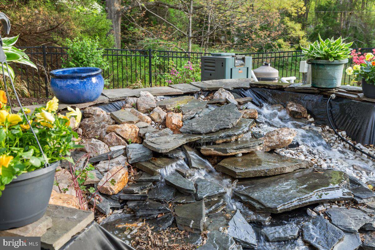 11846 Chapel Road Clifton, VA 20124 - Photo 20 of 143 Tranquil garden waterfall oasis.