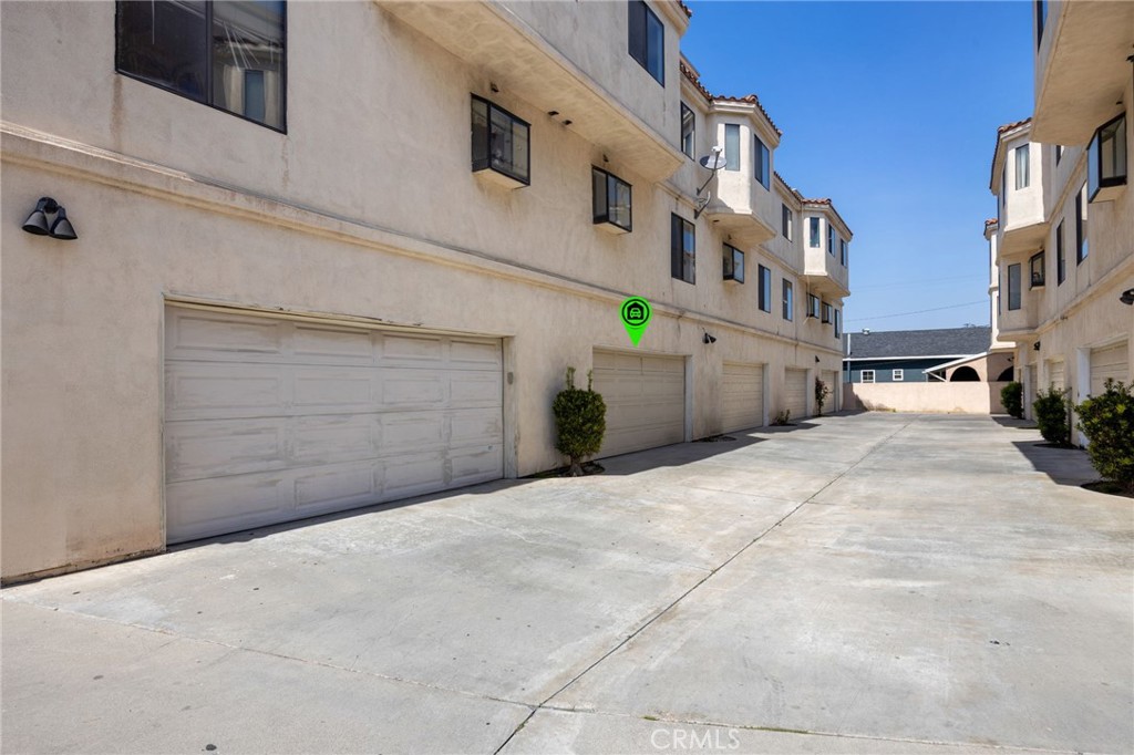 11033 Old River School Road, Unit 8 Downey, CA 90241 - Photo 46 of 57 Oversized 2 car garage with direct access to home