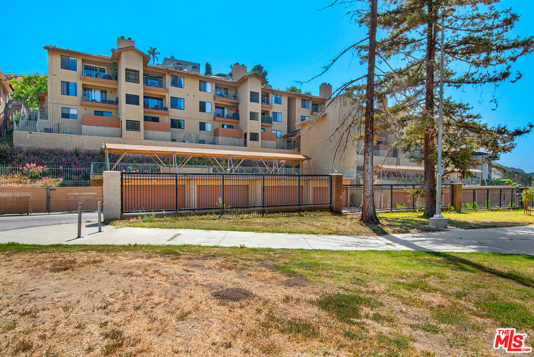 4451 Don Ricardo Drive, Unit 9 Los Angeles, CA 90008 - Photo 23 of 23 a house view with a outdoor space