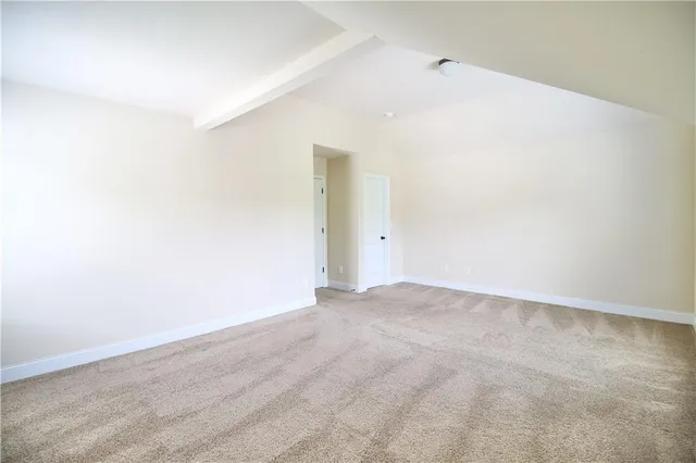 an empty room with an entryway