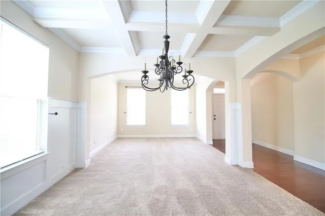 a view of a chandelier in a room
