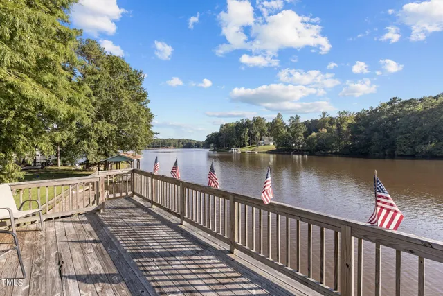 a view of a lake with a deck