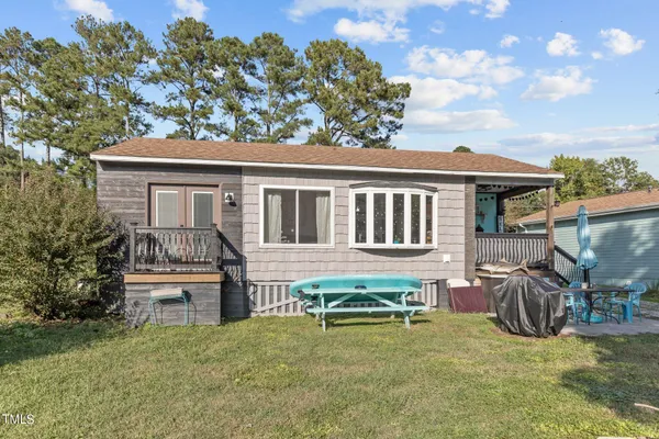 a house view with a garden space