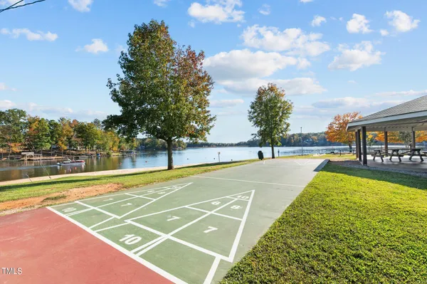 a view of an outdoor space and tennis court