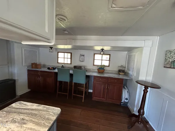 a view of kitchen and dining room