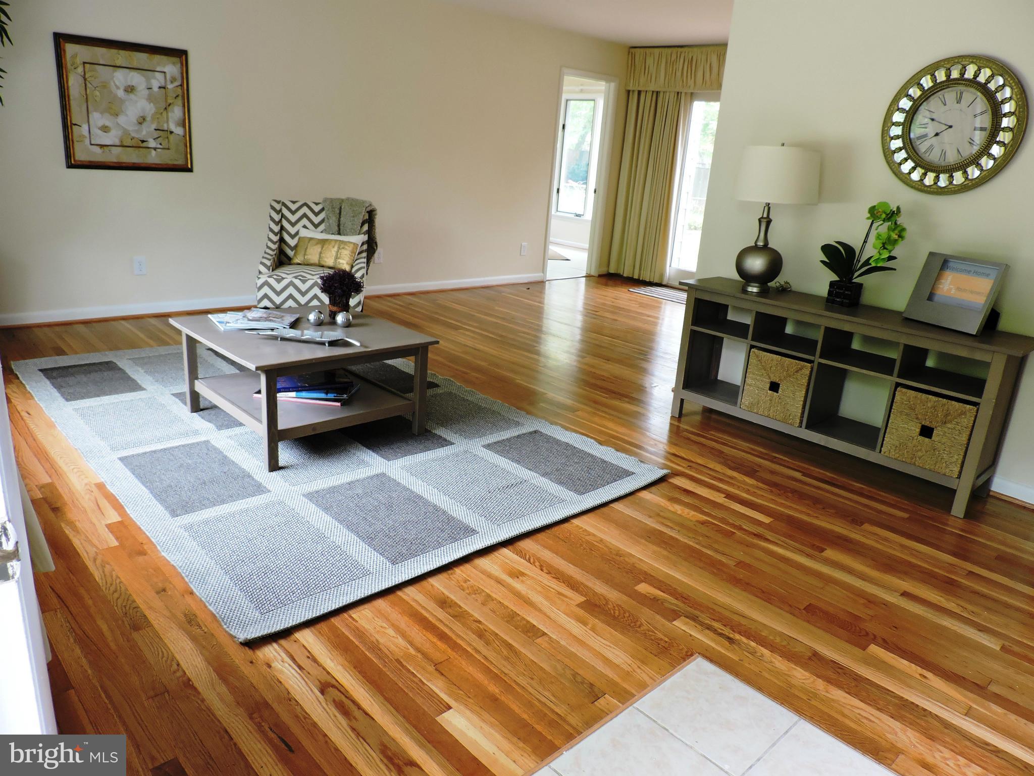 5011 Roslyn Road Annandale, VA 22003 - Photo 11 of 28 a living room with furniture and a table