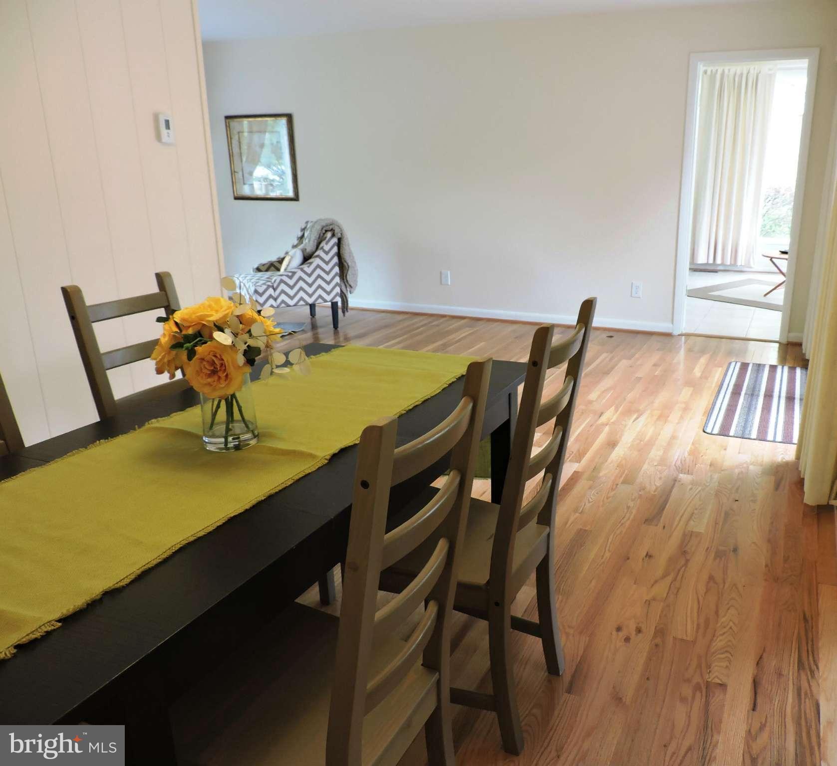 5011 Roslyn Road Annandale, VA 22003 - Photo 15 of 28 a dining room with furniture and a window