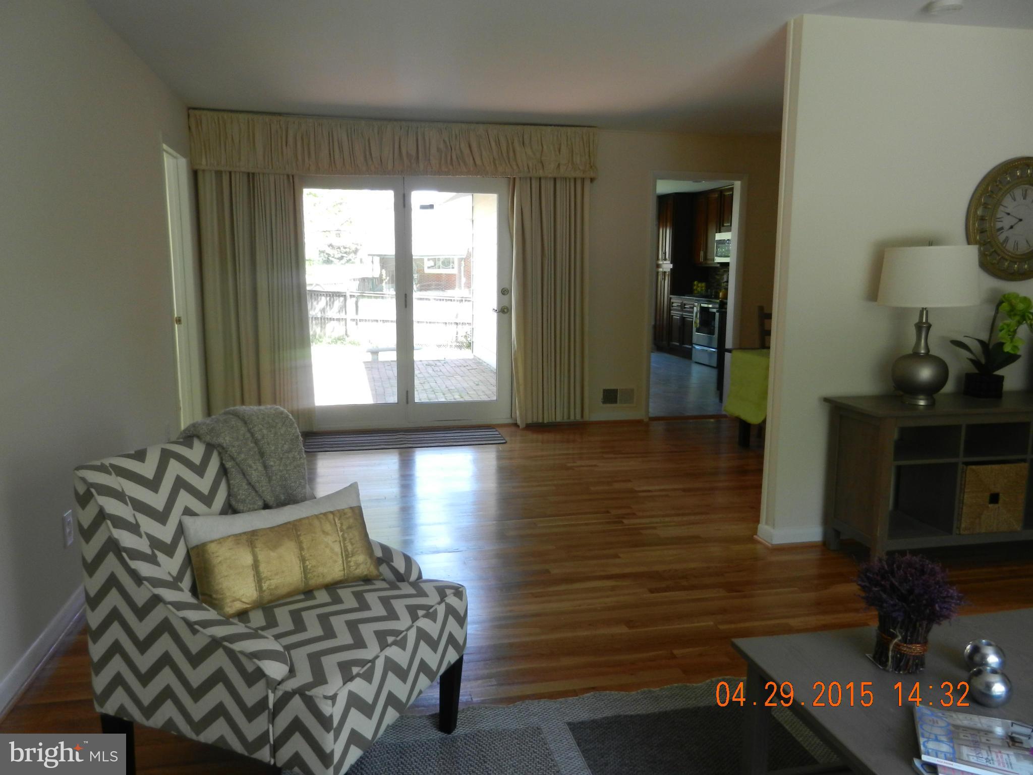 5011 Roslyn Road Annandale, VA 22003 - Photo 16 of 28 a living room with furniture and a window