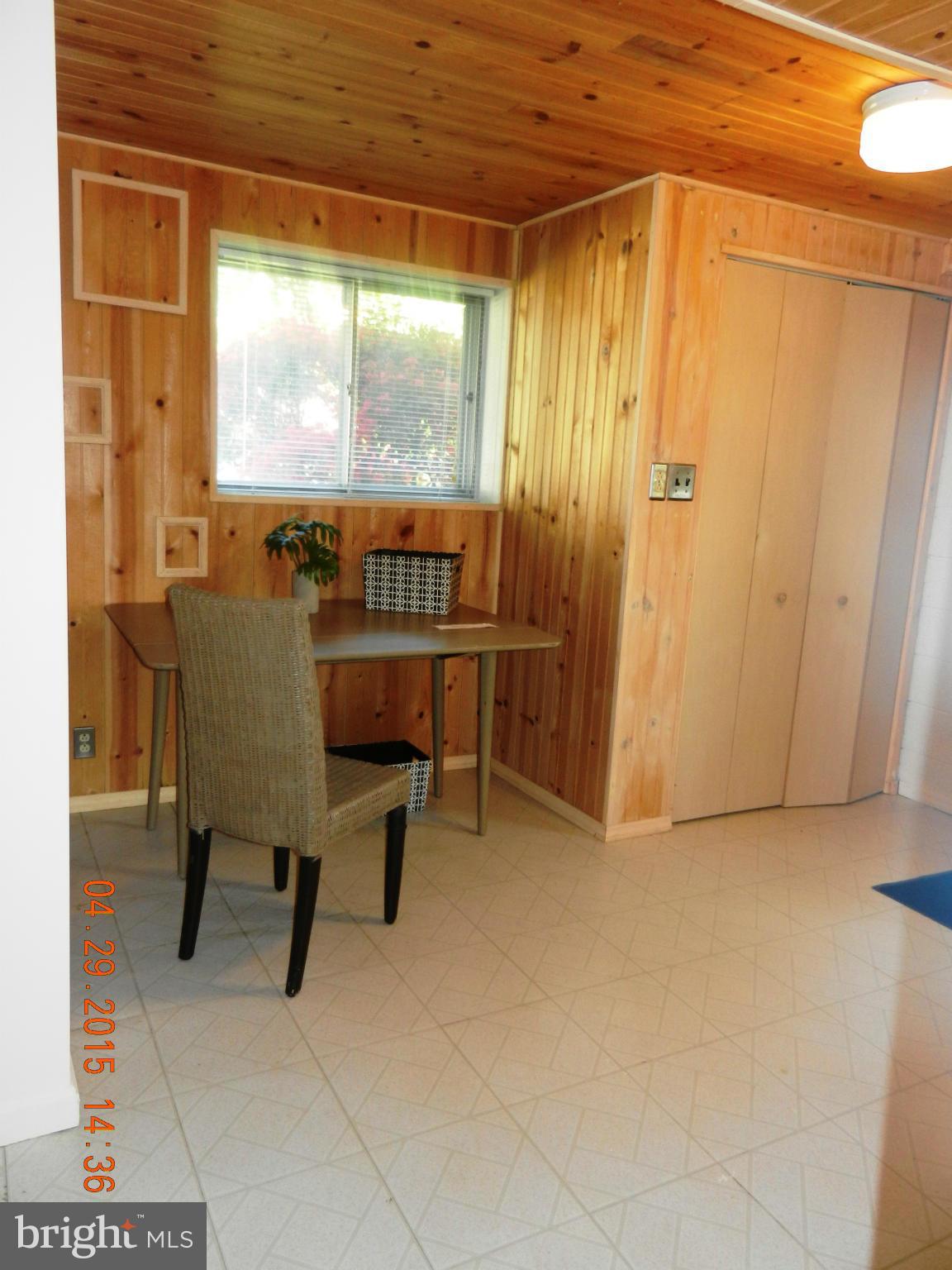 5011 Roslyn Road Annandale, VA 22003 - Photo 17 of 28 a view of a room with furniture and a window