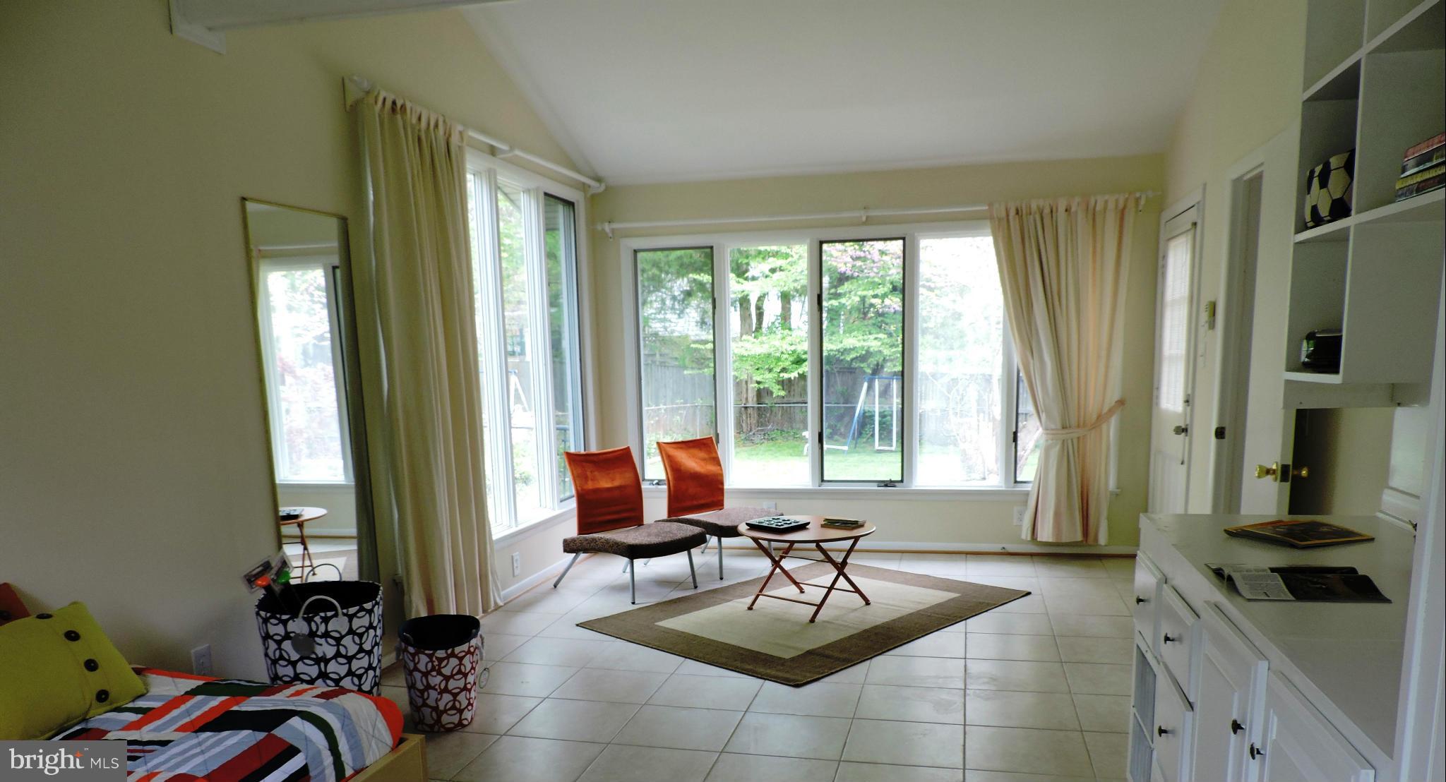 5011 Roslyn Road Annandale, VA 22003 - Photo 4 of 28 a living room with furniture and a large window