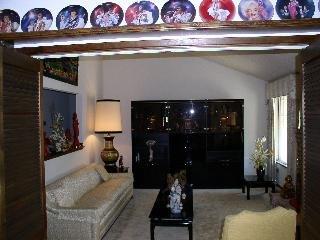 1655 Ridley Avenue Santa Rosa, CA 95401 - Photo 2 of 2 a living room with furniture and a fireplace