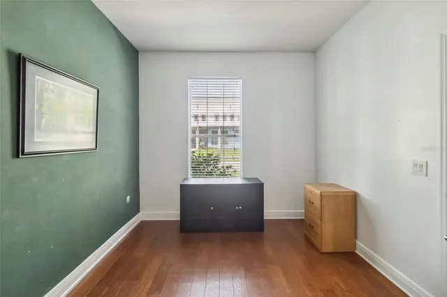 an aerial view of a house with a lake view