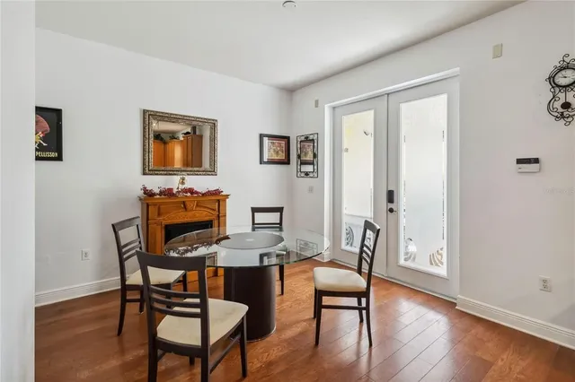 a view of a livingroom with furniture and a window