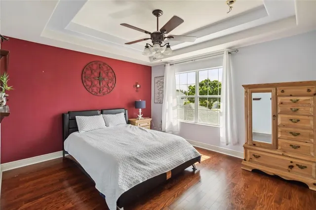 a bedroom with furniture and a window