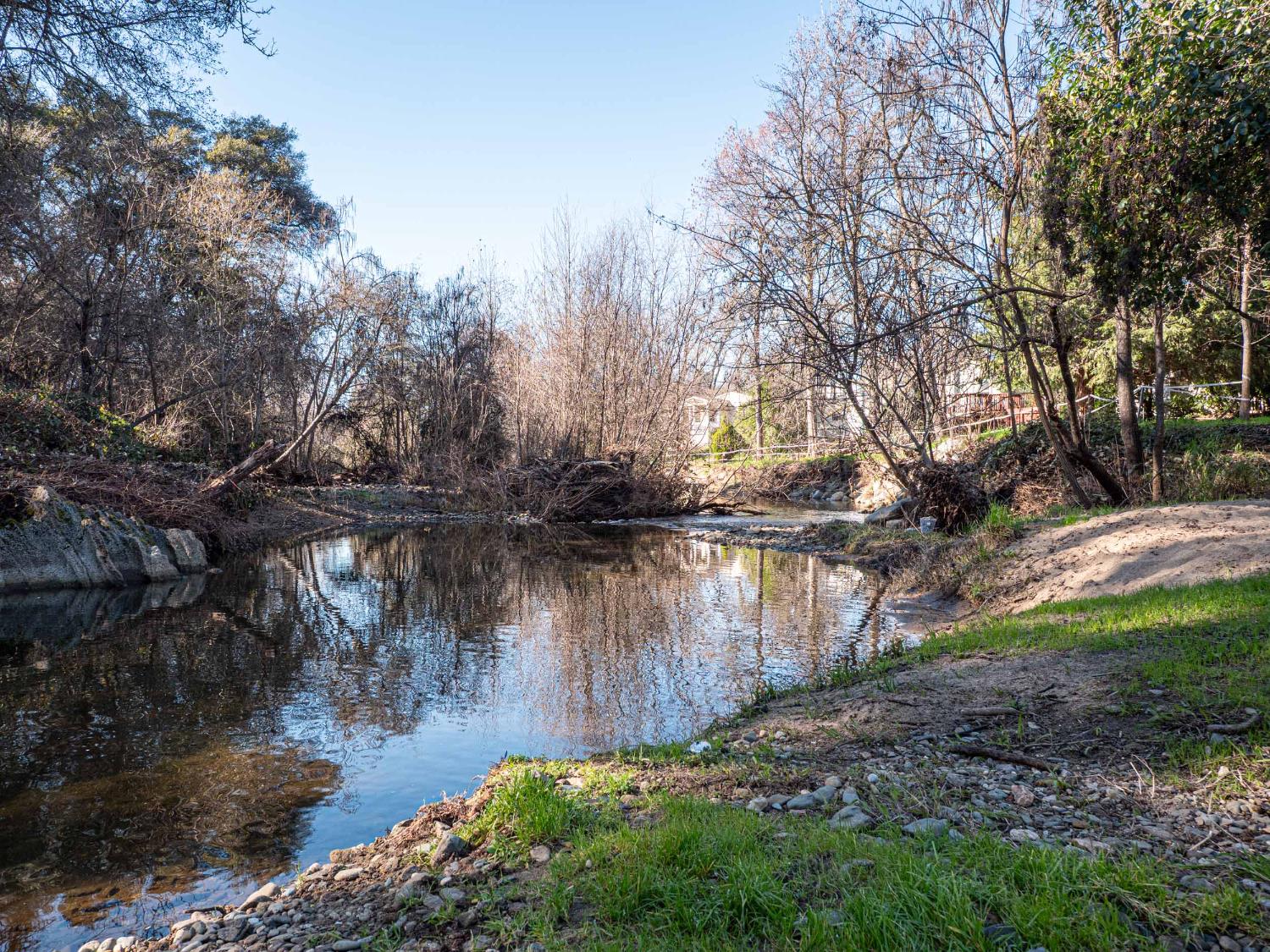 6540 Virginiatown Road, Unit 30 Newcastle, CA 95658 - Photo 1 of 24 a backyard of a house with lots of green space and lake view