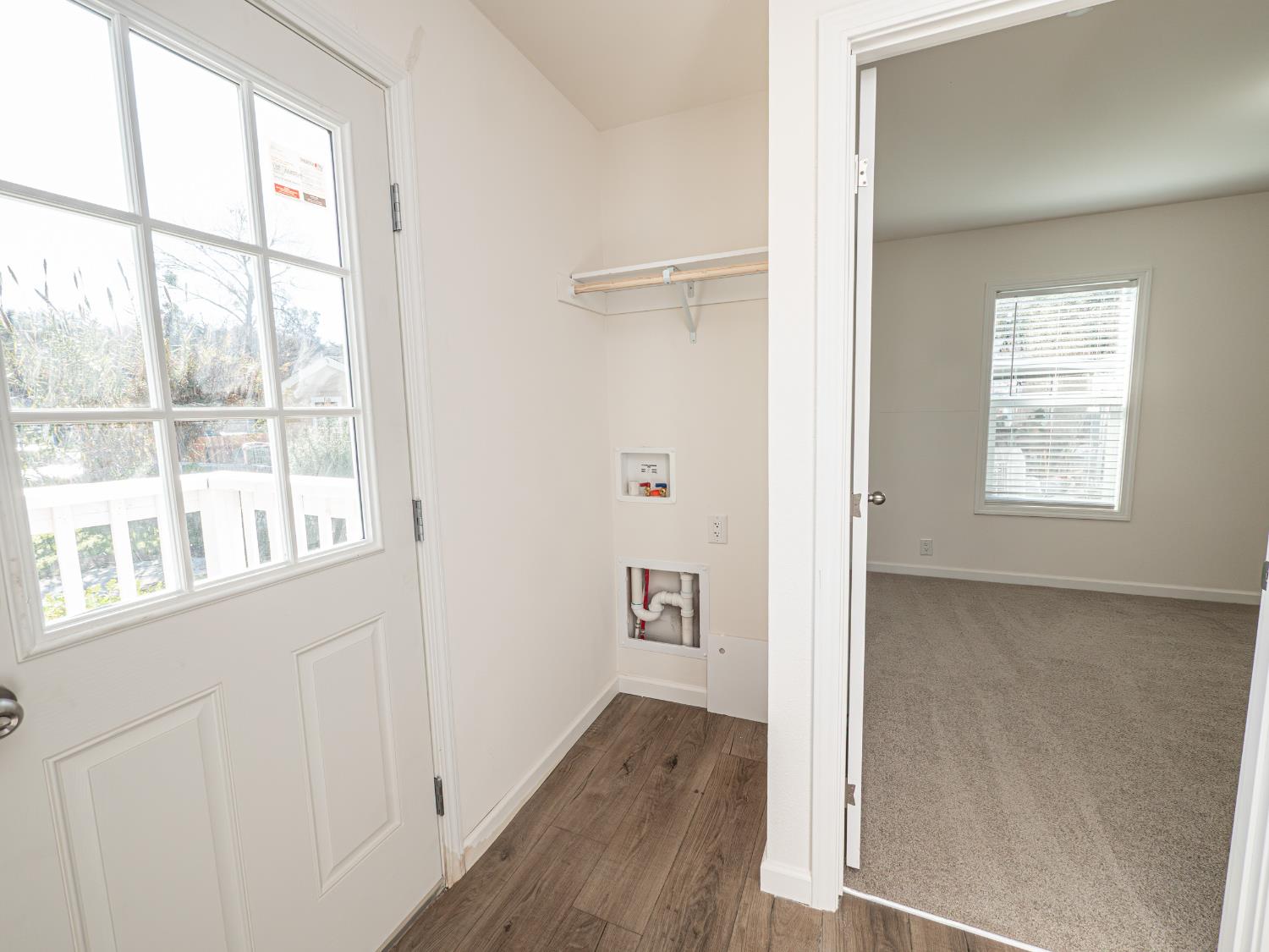 6540 Virginiatown Road, Unit 30 Newcastle, CA 95658 - Photo 9 of 24 an entryway with wooden floor and windows