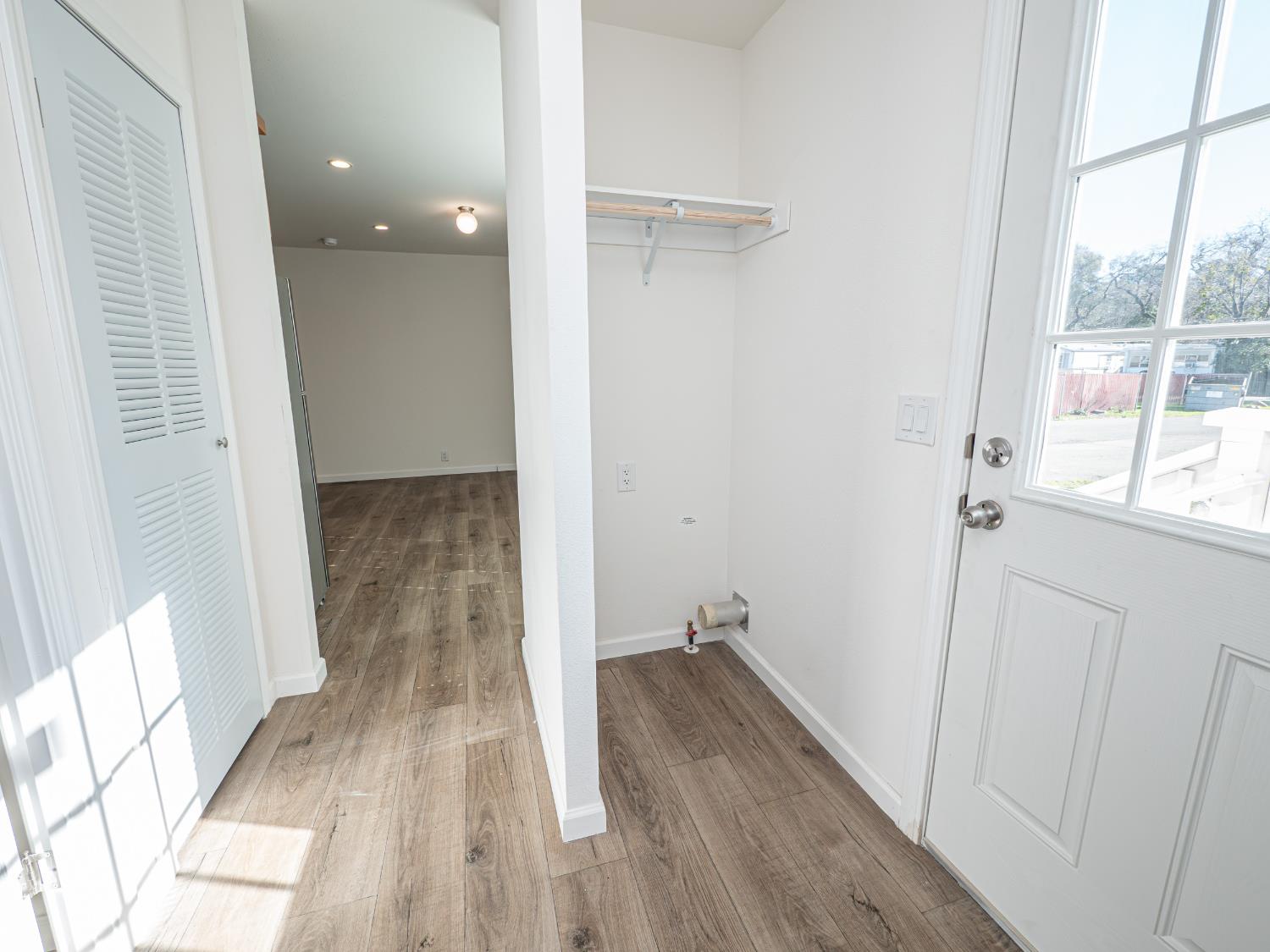 6540 Virginiatown Road, Unit 30 Newcastle, CA 95658 - Photo 10 of 24 a view of a room with wooden floor and a window