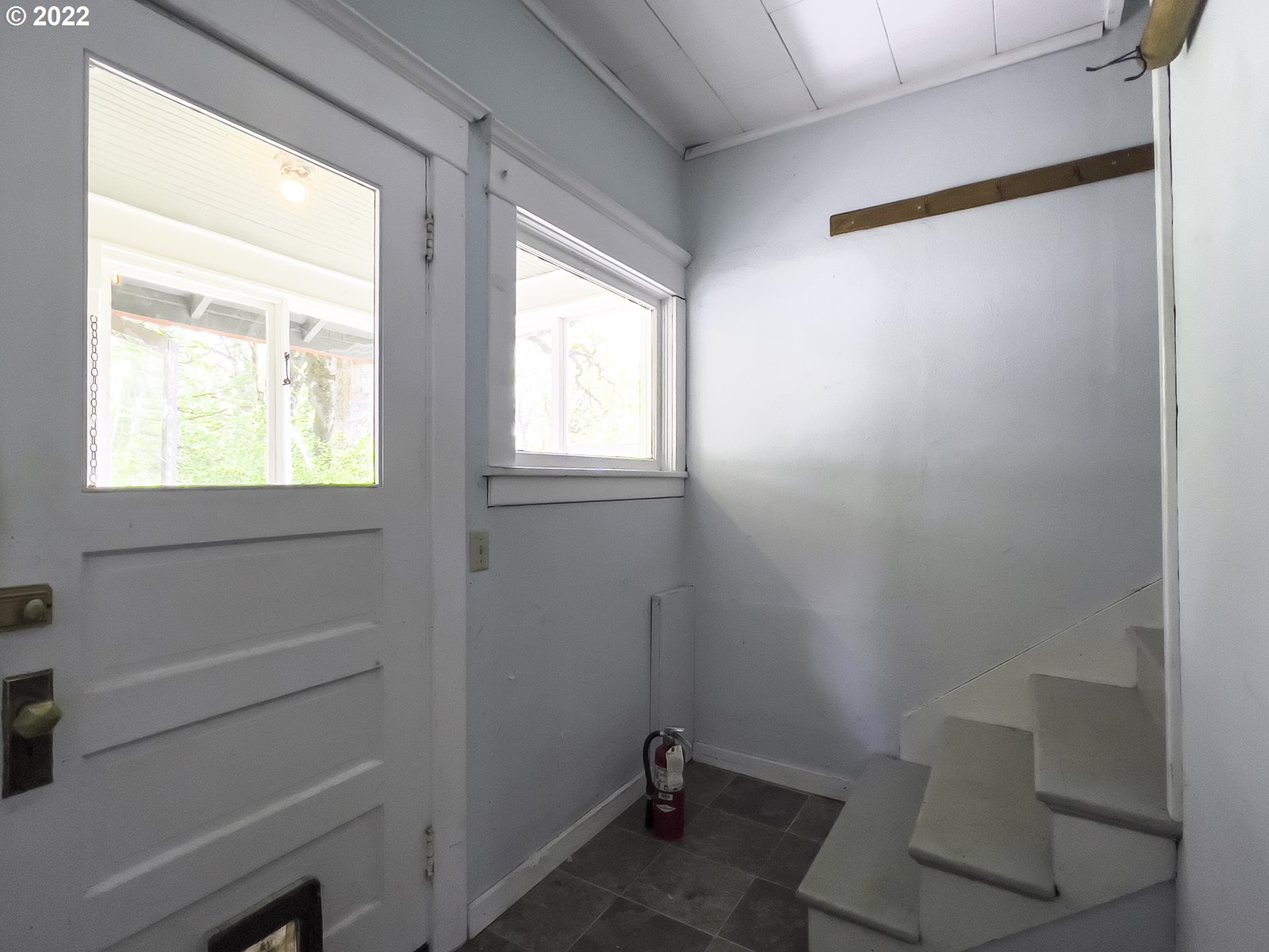 54647 Southwest Patton Valley Road Gaston, OR 97119 - Photo 14 of 29 a bathroom with a window and a toilet