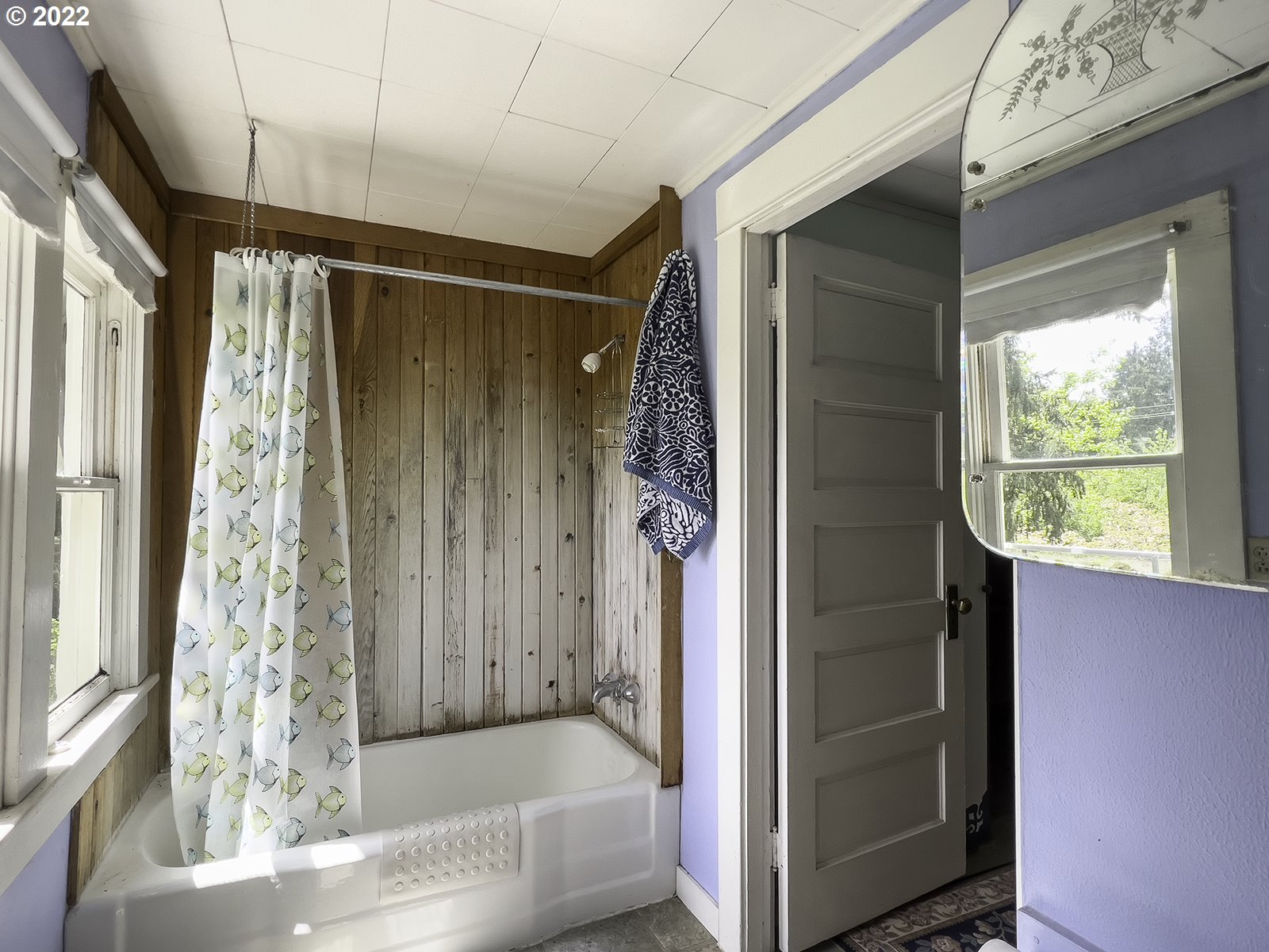 54647 Southwest Patton Valley Road Gaston, OR 97119 - Photo 22 of 29 a bathroom with a glass shower door and a window
