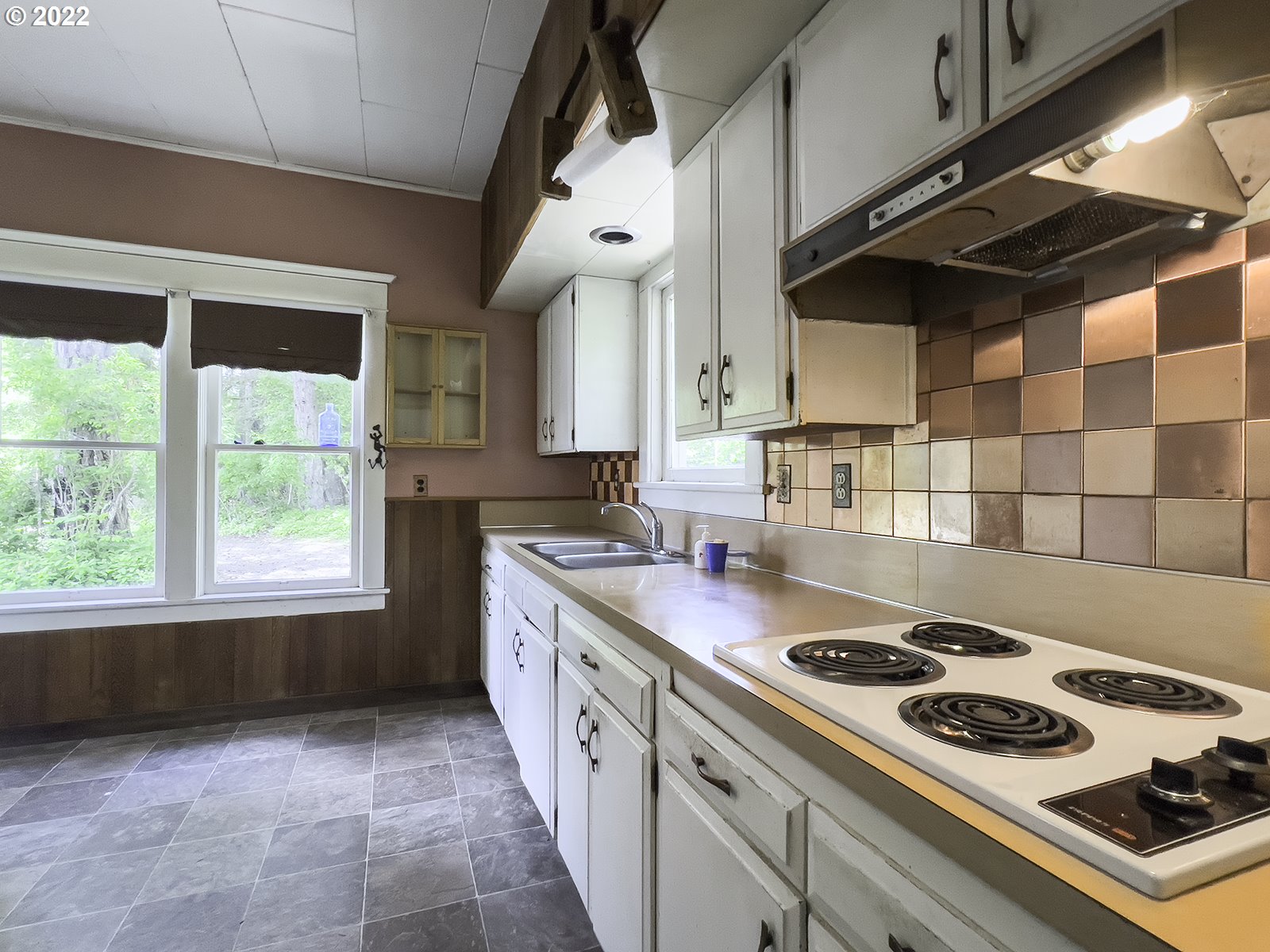 54647 Southwest Patton Valley Road Gaston, OR 97119 - Photo 9 of 29 a kitchen with a stove and a sink