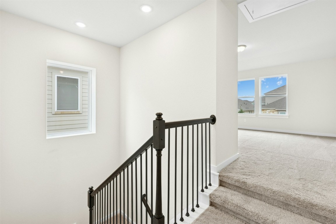 4313 Contrail Lane Round Rock, TX 78665 - Photo 15 of 32 a view of a hallway with windows