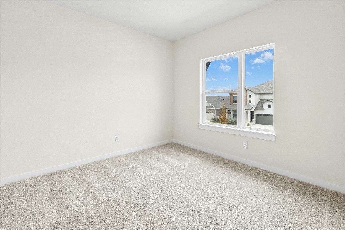 4313 Contrail Lane Round Rock, TX 78665 - Photo 20 of 32 a view of an empty room with a window