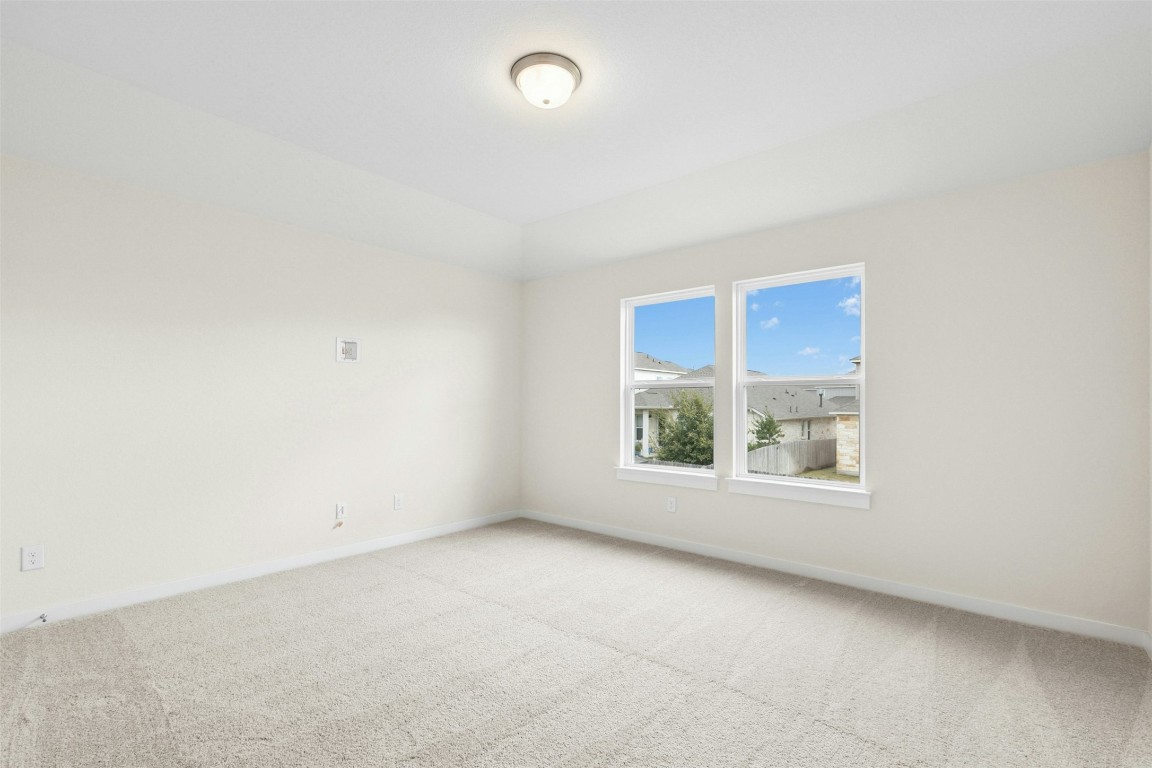 4313 Contrail Lane Round Rock, TX 78665 - Photo 22 of 32 an empty room with a window