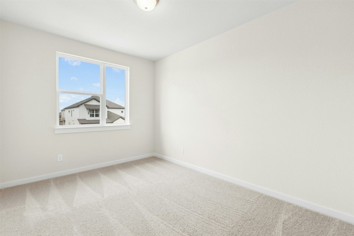 4313 Contrail Lane Round Rock, TX 78665 - Photo 24 of 32 an empty room with windows