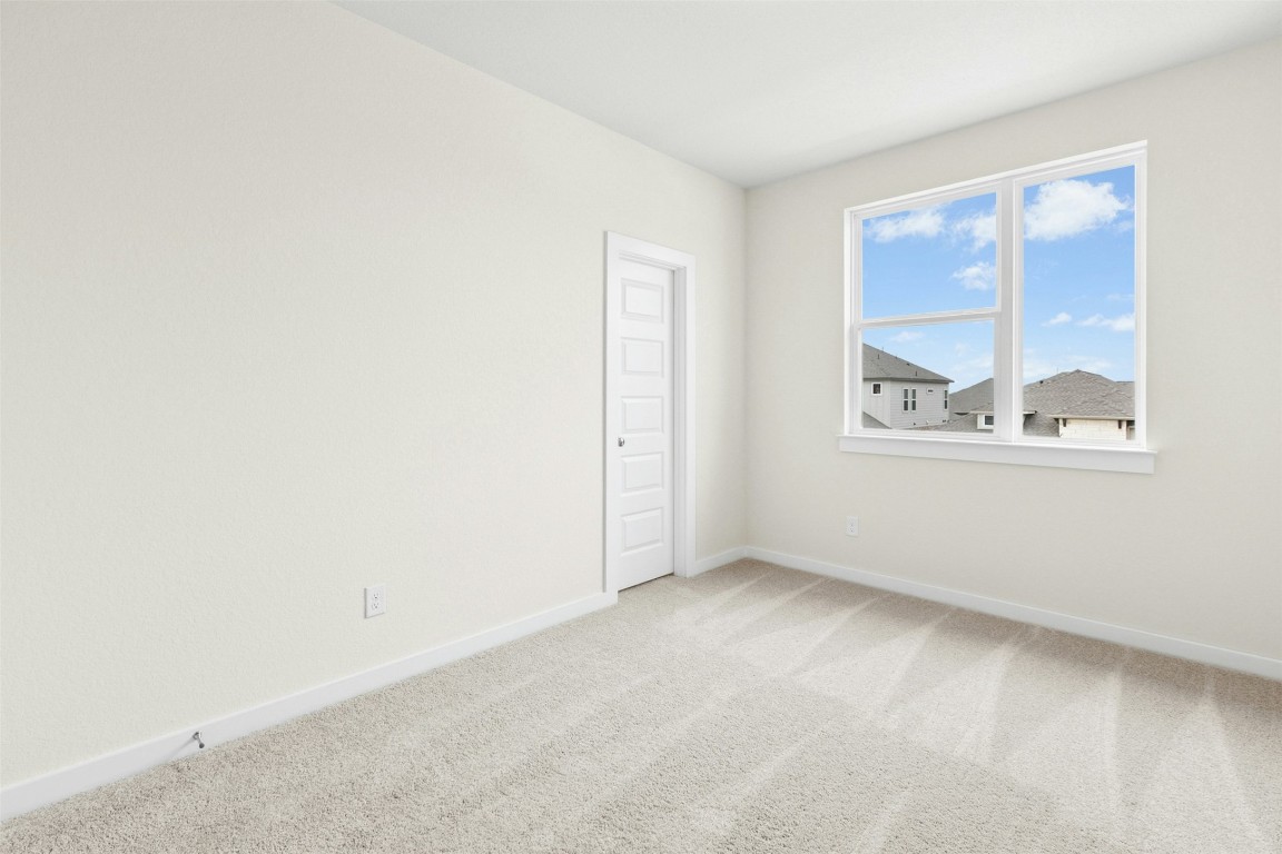 4313 Contrail Lane Round Rock, TX 78665 - Photo 25 of 32 an empty room with windows