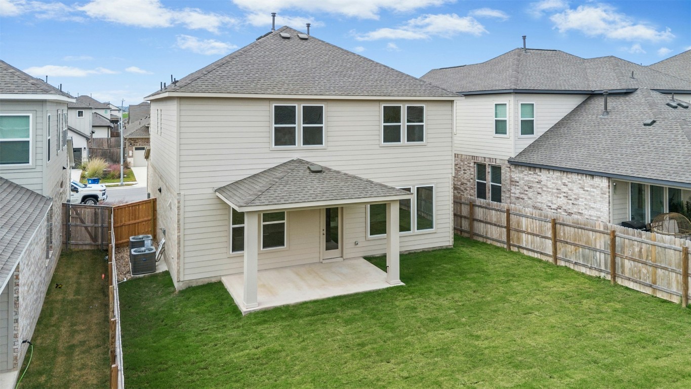 4313 Contrail Lane Round Rock, TX 78665 - Photo 30 of 32 a front view of a house with a yard