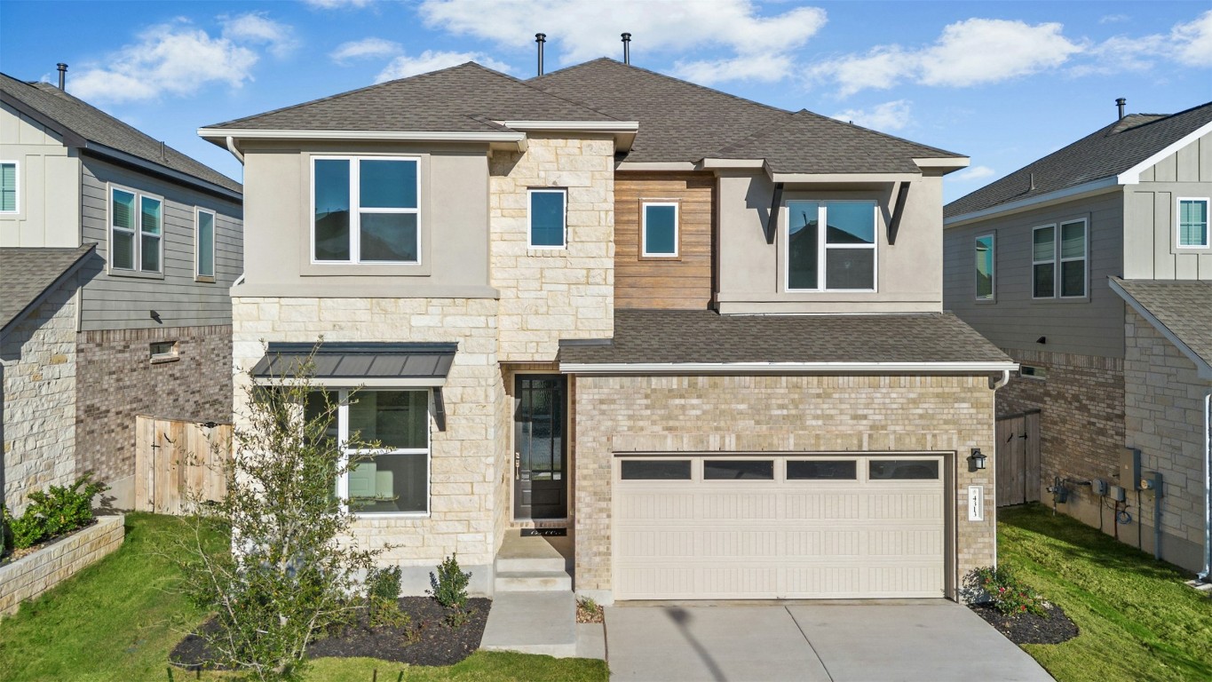 4313 Contrail Lane Round Rock, TX 78665 - Photo 3 of 32 a front view of a house with a yard