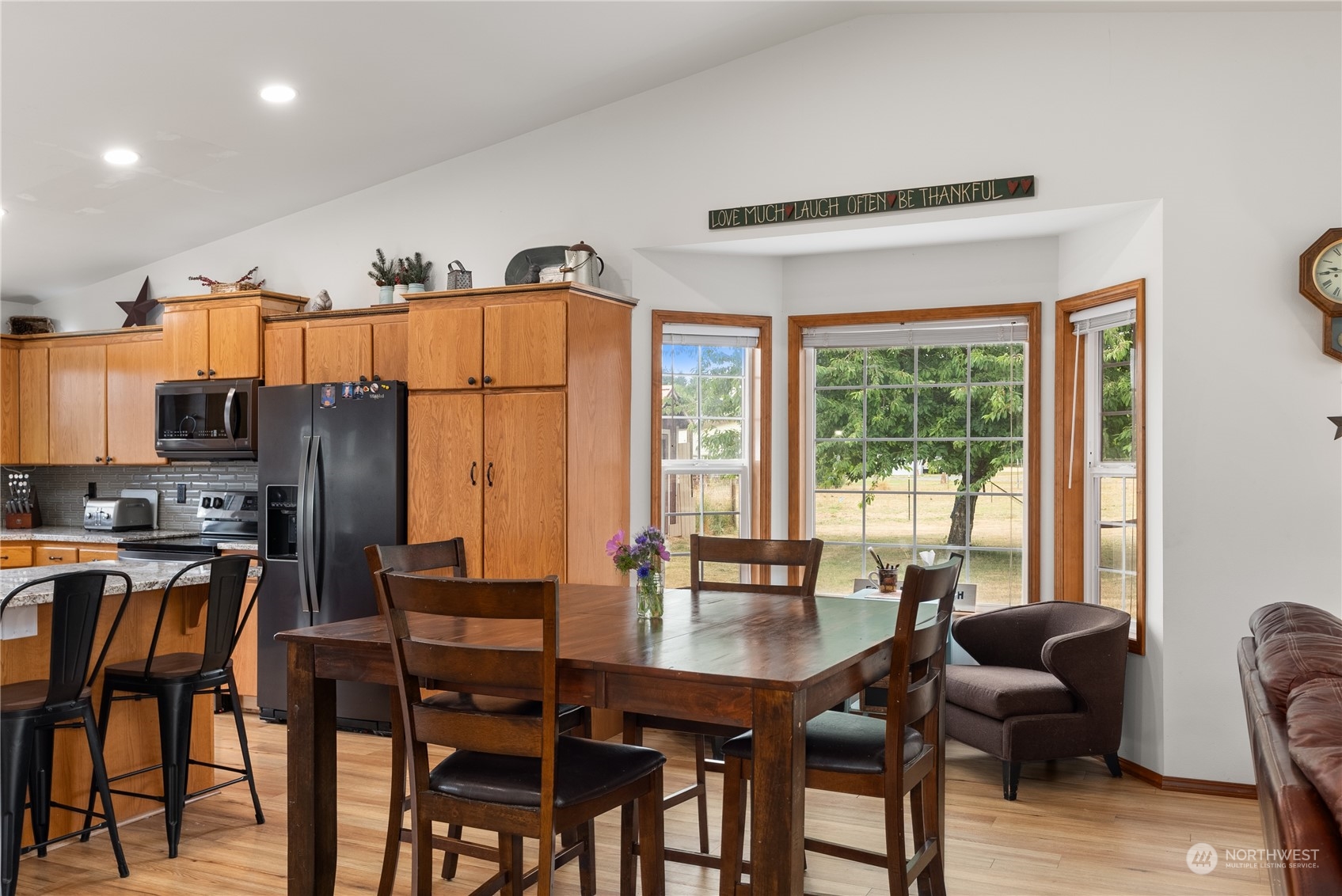 169 Conradi Road Winlock, WA 98596 - Photo 11 of 38 a dining room with furniture and wooden floor