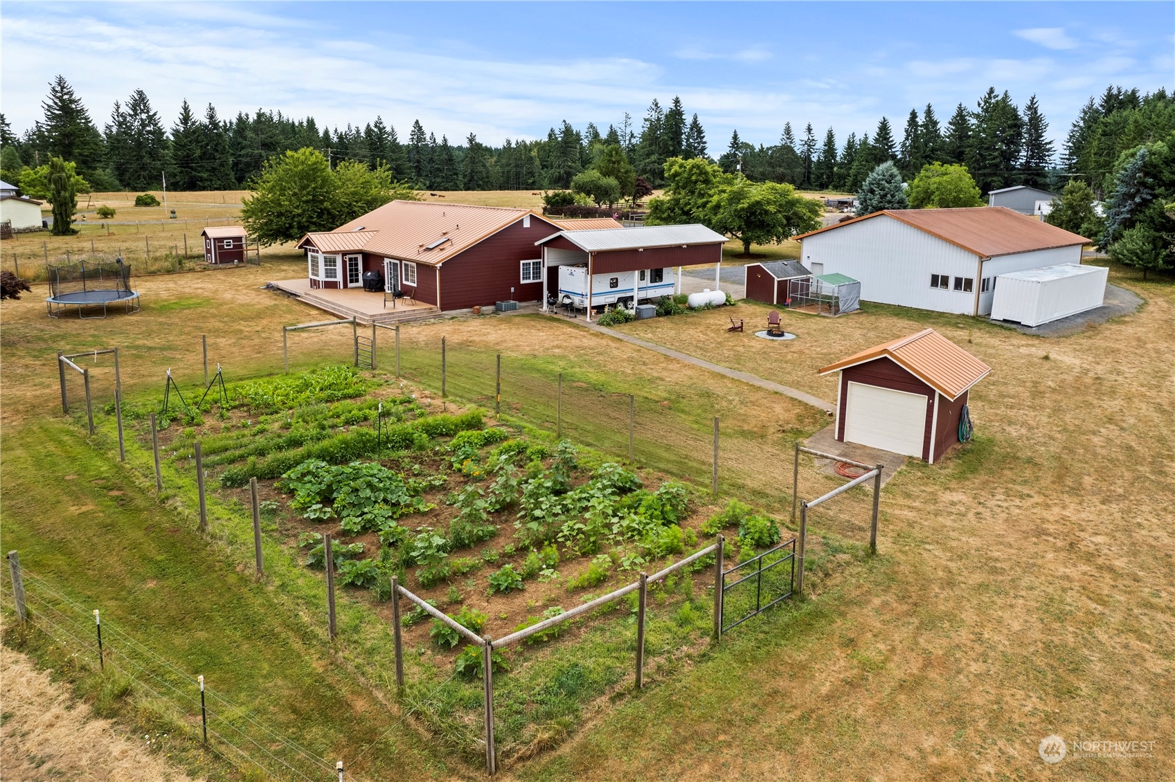 169 Conradi Road Winlock, WA 98596 - Photo 27 of 38 a view of a house with pool and lawn chairs