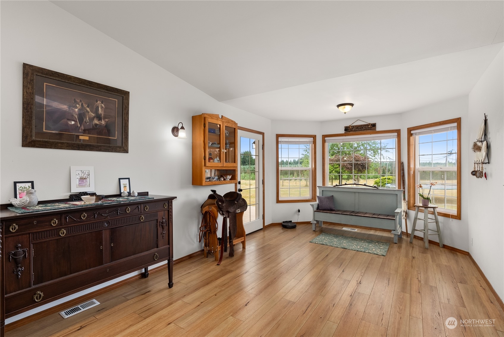 169 Conradi Road Winlock, WA 98596 - Photo 8 of 38 a view of a workspace with furniture and a window