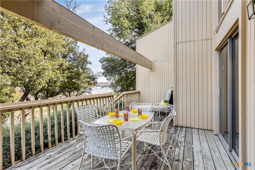 133 Comanche Drive Point Venture, TX 78645 - Photo 11 of 32 Rear deck with lake views and privacy in back