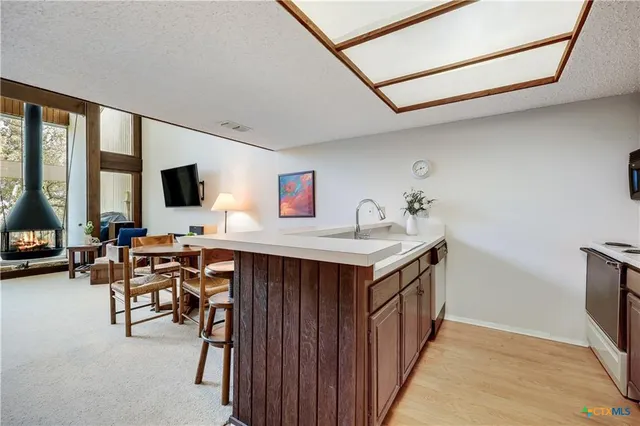 $390,000 | 133 Comanche Drive, Point Venture, TX 78645