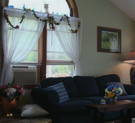 851 Cotuit Road Mashpee, MA 02649 - Photo 3 of 5 a living room with furniture and a window