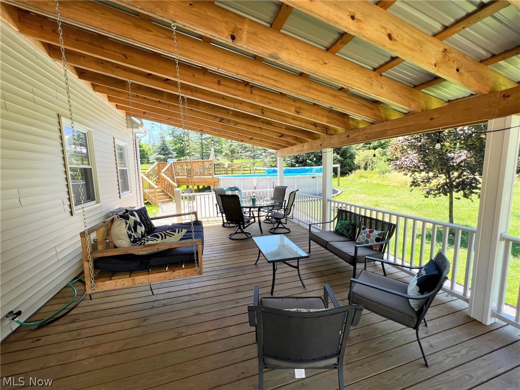 6434 Ledge Road Thompson, OH 44086 - Photo 24 of 34 Covered Back Deck