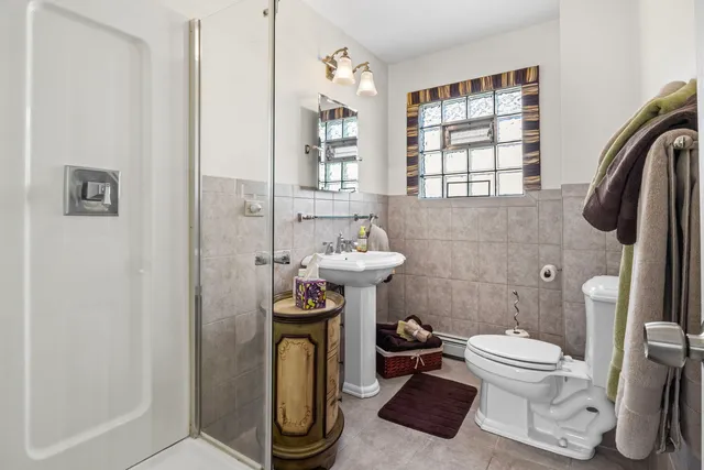 a bathroom with a toilet and a sink