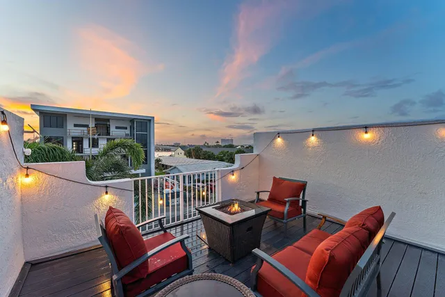 a balcony with outdoor seating