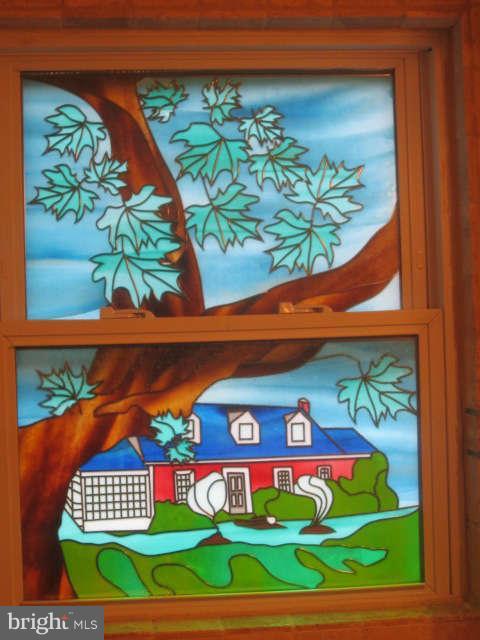 9108 Sudley Road Manassas, VA 20110 - Photo 13 of 30 Stain Glass of home