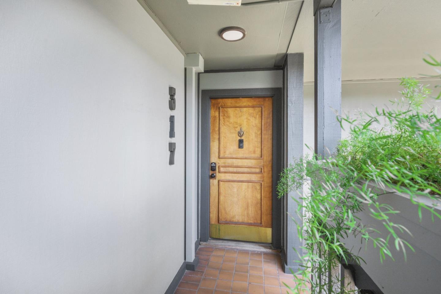 425 Anchor Road, Unit 317 San Mateo, CA 94404 - Photo 11 of 53 a view of a front door and wooden floor