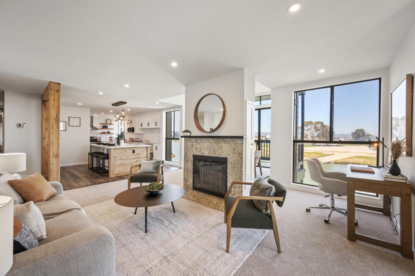 425 Anchor Road, Unit 317 San Mateo, CA 94404 - Photo 13 of 53 a living room with furniture a fireplace and a floor to ceiling window