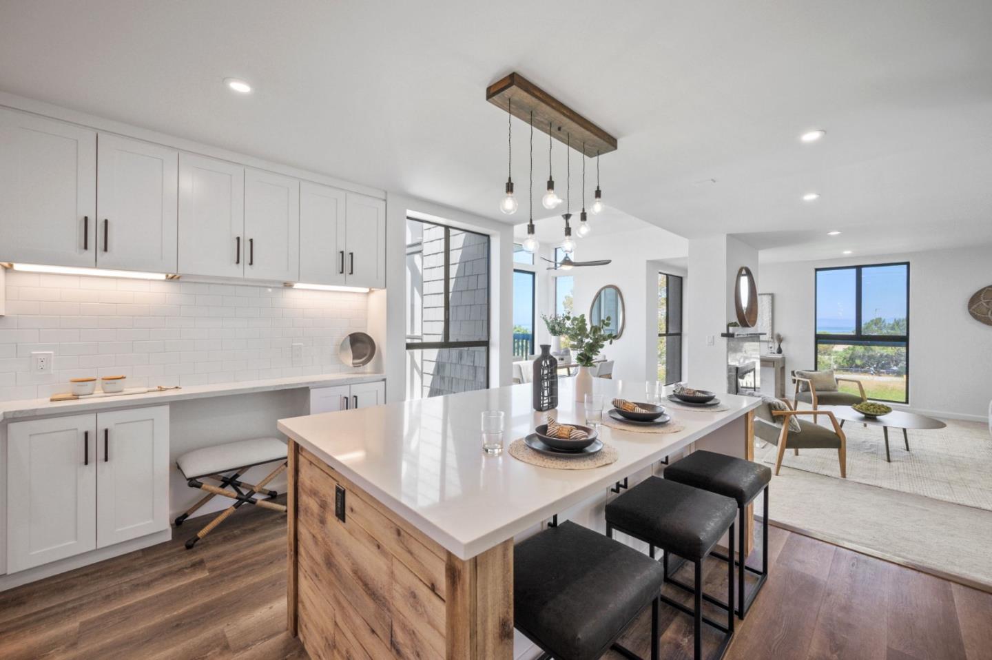 425 Anchor Road, Unit 317 San Mateo, CA 94404 - Photo 21 of 53 a kitchen with a dining table chairs cabinets and stainless steel appliances