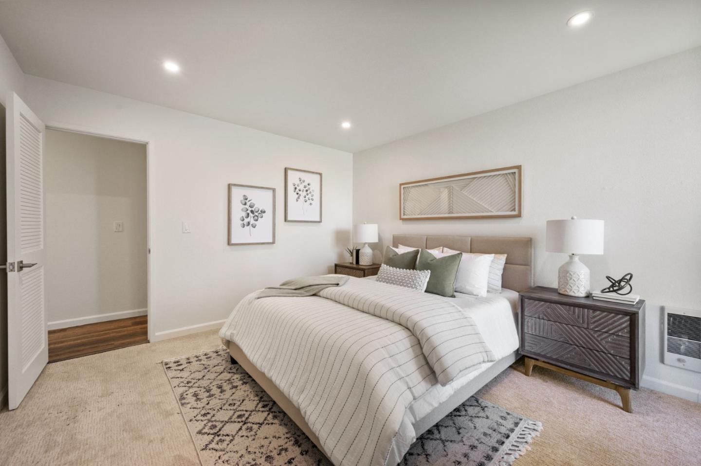 425 Anchor Road, Unit 317 San Mateo, CA 94404 - Photo 31 of 53 a bedroom with a bed and a lamp