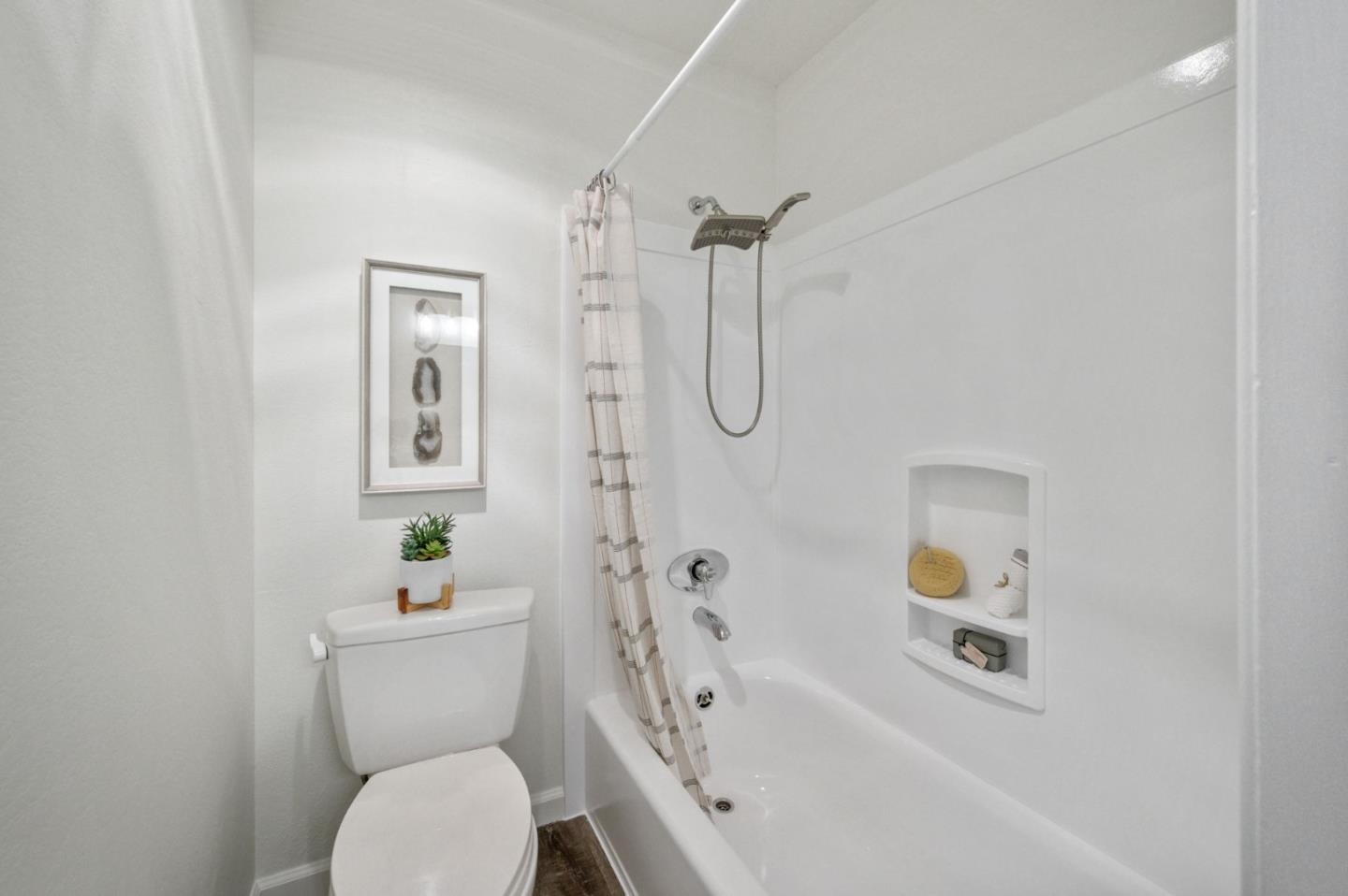 425 Anchor Road, Unit 317 San Mateo, CA 94404 - Photo 32 of 53 a white toilet sitting next to a bath tub
