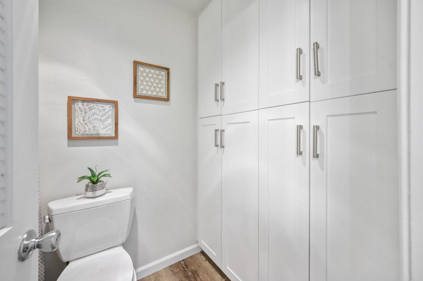 425 Anchor Road, Unit 317 San Mateo, CA 94404 - Photo 40 of 53 a white toilet sitting next to a bathroom sink