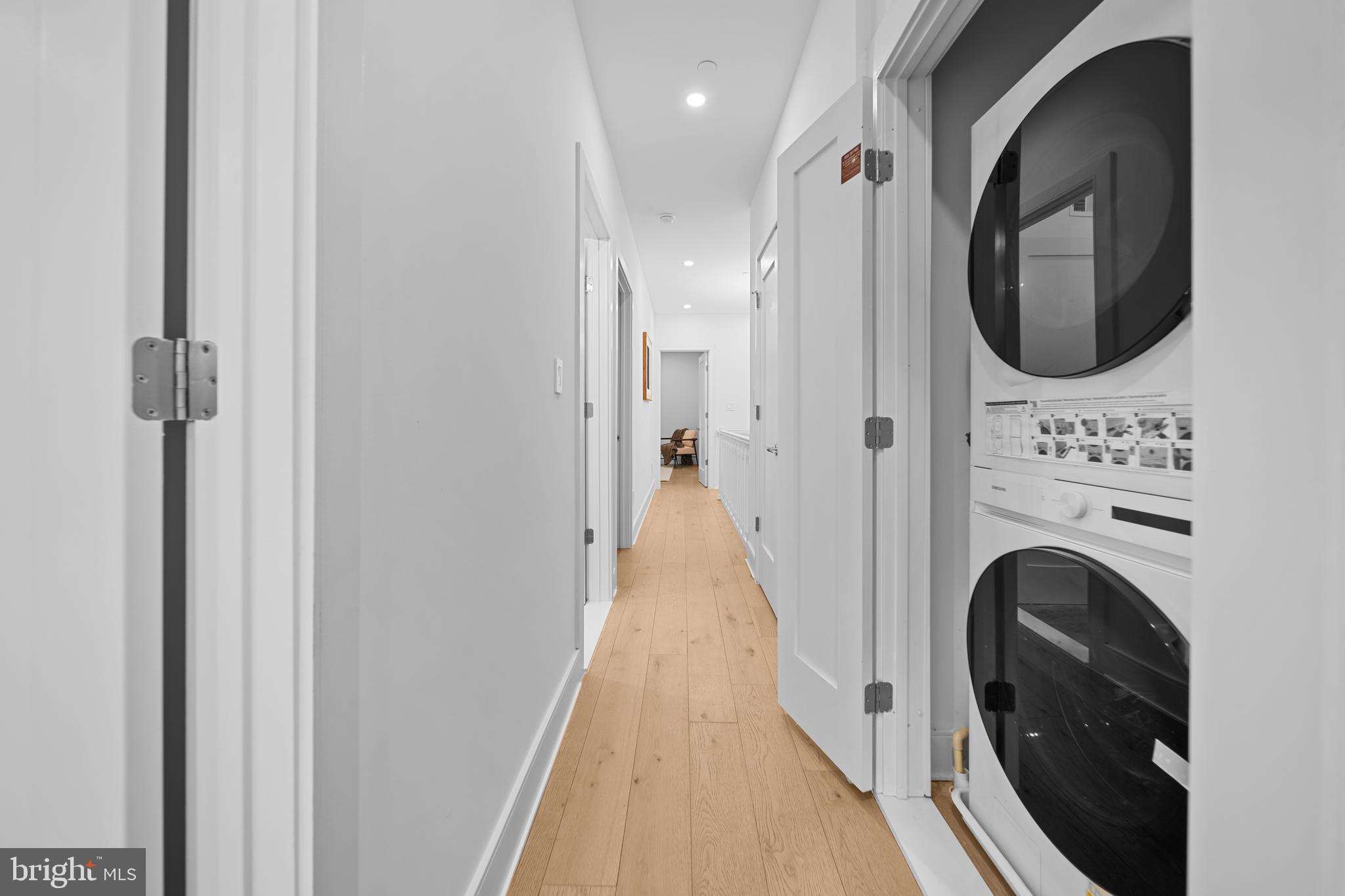 1121 Morse Street Northeast, Unit 3 Washington, DC 20002 - Photo 23 of 25 a view of a hallway with washer and dryer