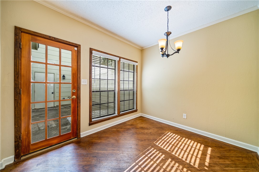 3052 Quail Springs Road, Unit A3 Corpus Christi, TX 78414 - Photo 13 of 27 a view of livingroom with hardwood floor and window