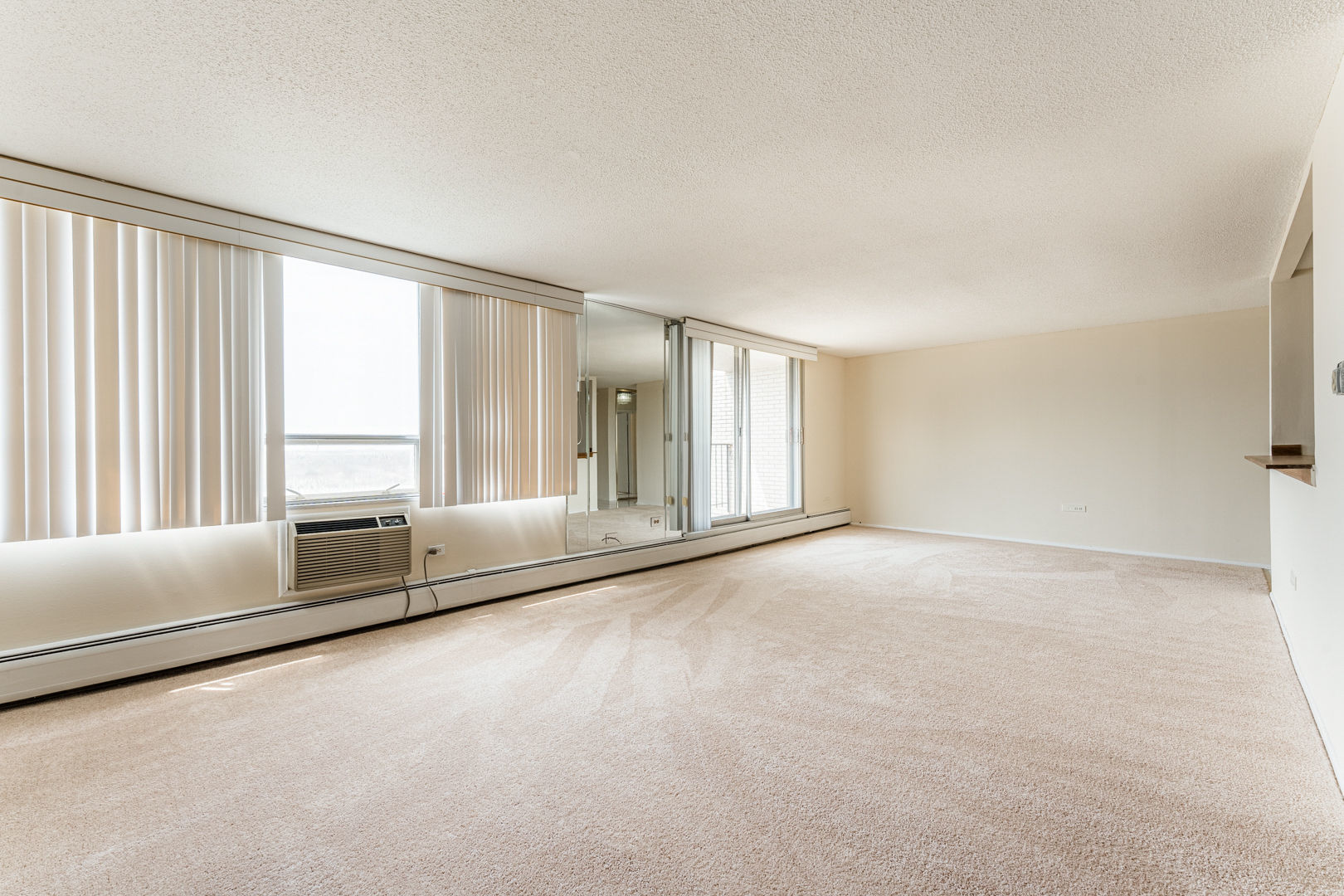 8801 Golf Road, Unit 10D Niles, IL 60714 - Photo 12 of 24 a view of an empty room with a window